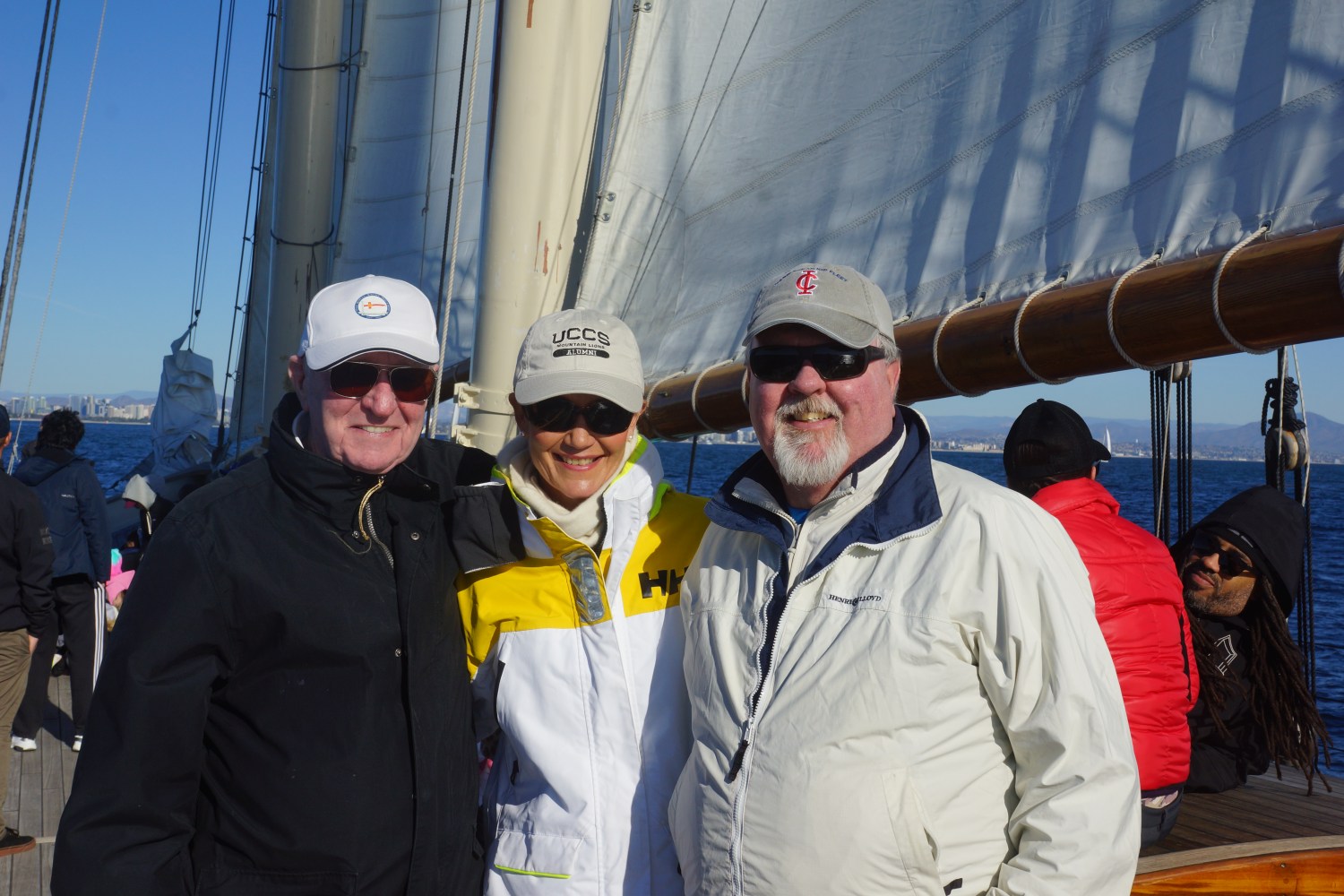 people aboard a sail boat 