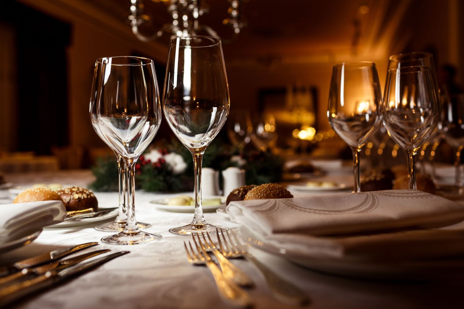 a table topped with glasses of wine