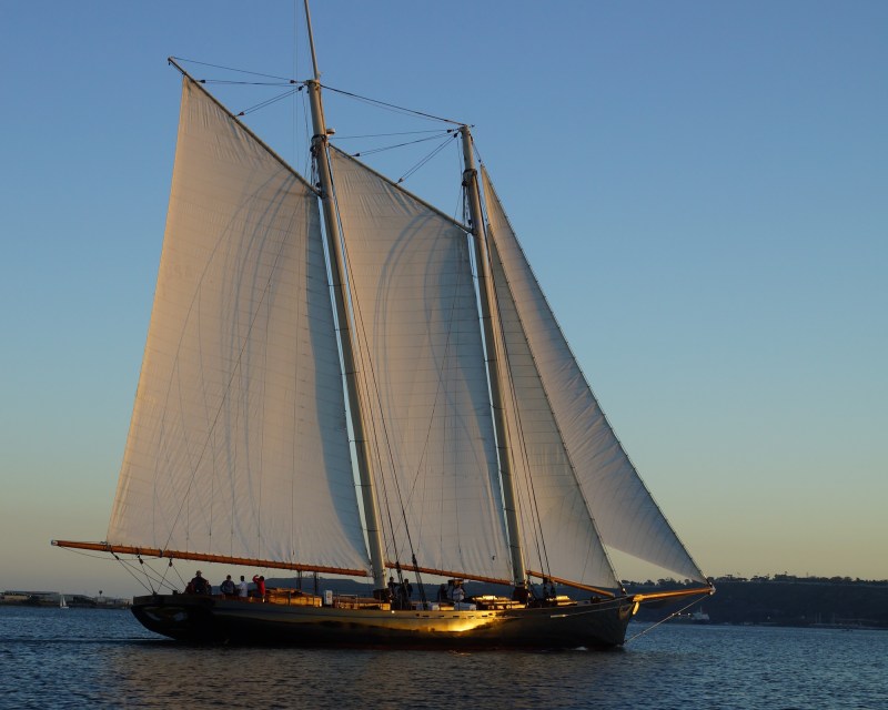 Sail-into-the-Sunset a large ship in a body of water