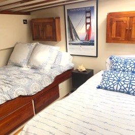 a bedroom with a bed in a room