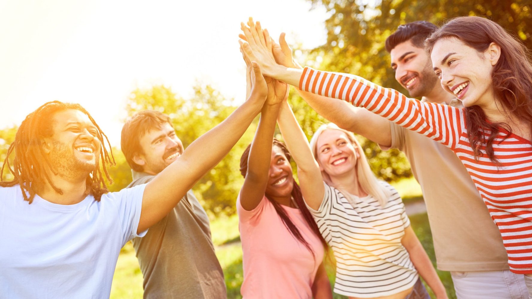 a group of friends high fiving