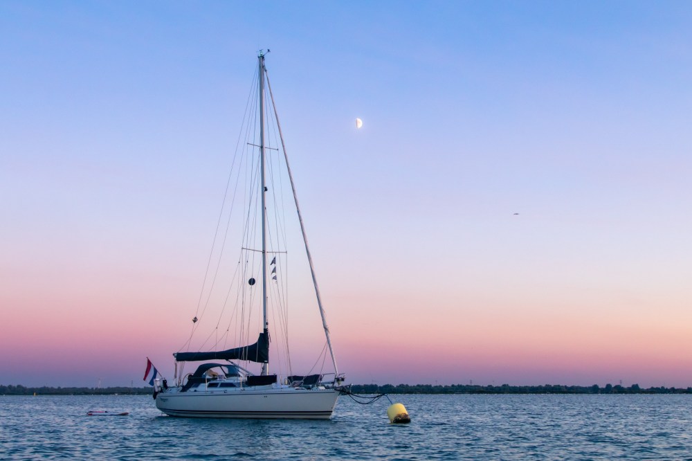 a small boat in a large body of water