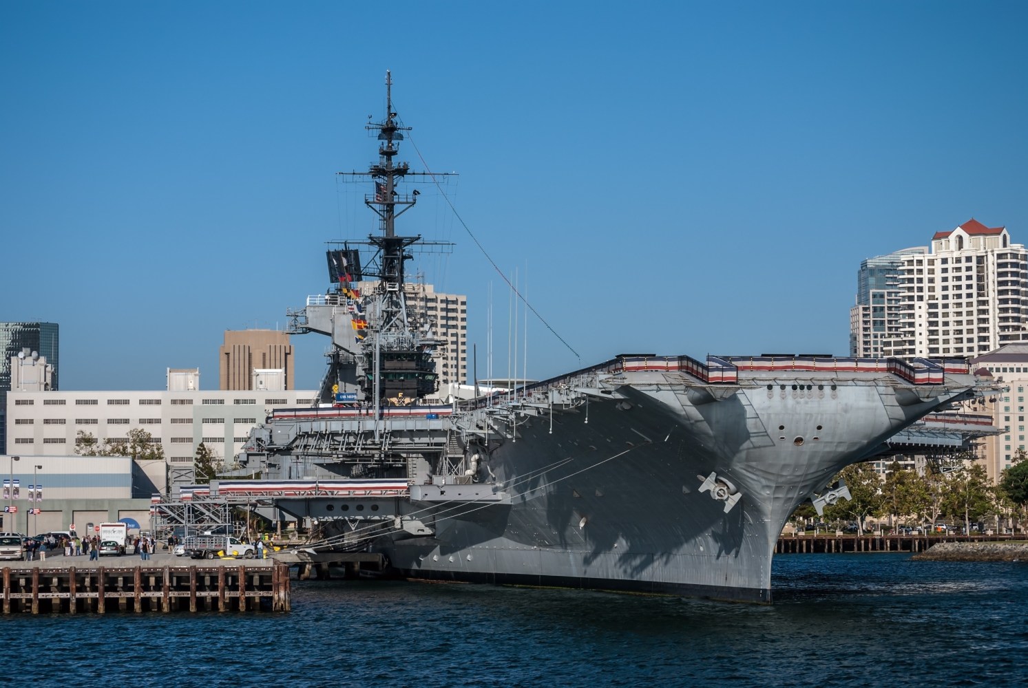 a large military ship in a body of water