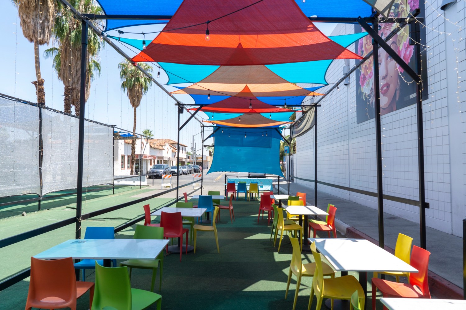 a table topped with a blue umbrella