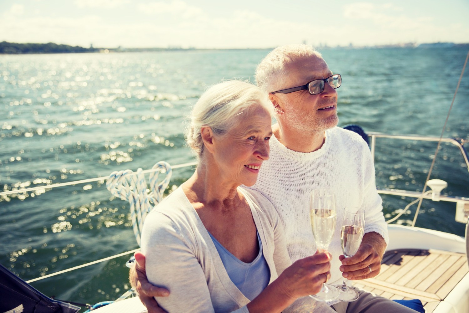 an older couple sitting on a boat