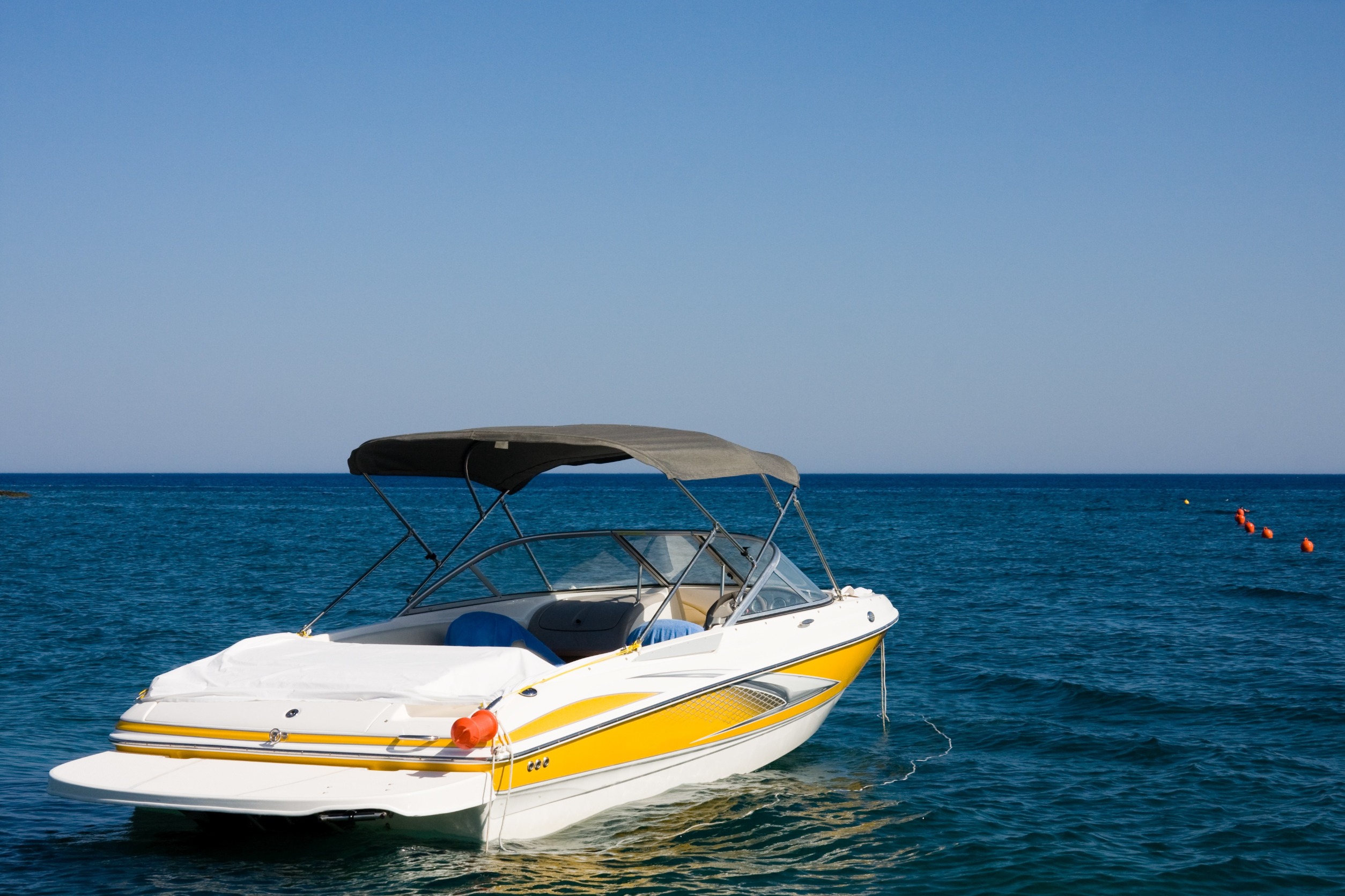 a small boat in a body of water