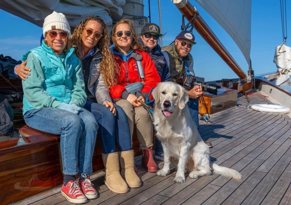 family gathered on a boat 